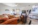 Comfortable living space features modern furnishings, a ceiling fan and bright natural light at 15225 N 100Th St # 1185, Scottsdale, AZ 85260