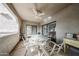 Charming covered patio with ceiling fan and sliding glass doors, great for entertaining or enjoying a quiet evening at 15225 N 100Th St # 1185, Scottsdale, AZ 85260