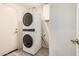 Laundry room with a stacked washer and dryer at 1583 N Constellation Ct, Gilbert, AZ 85234