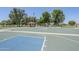 Community basketball court including hopscotch area, picnic tables, and a covered ramada at 1616 N 125Th Ln, Avondale, AZ 85392