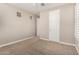Neutral bedroom with carpeted flooring and natural light at 18108 W Cassia Way, Goodyear, AZ 85338