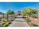 Exterior view of the community clubhouse showcasing desert landscaping and blue skies at 18108 W Cassia Way, Goodyear, AZ 85338