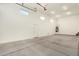 Bright garage with high ceilings, ideal for parking and storage solutions at 18108 W Cassia Way, Goodyear, AZ 85338