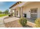 Charming park building with covered seating, white pillars and desert landscaping on a sunny day at 18108 W Cassia Way, Goodyear, AZ 85338
