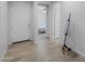 Inviting entryway with tile flooring and a view into a bedroom at 20904 E Swan Dr, Queen Creek, AZ 85142
