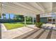 The outdoor patio features a custom shade structure at 216 E Harmont Dr, Phoenix, AZ 85020