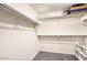 Walk-in closet providing ample storage with multiple rods and shelves to organize wardrobes at 2210 E Paraiso Dr, Phoenix, AZ 85024