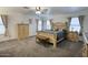 Relaxing main bedroom with carpet, complemented by matching furniture and natural light from the windows at 2210 E Paraiso Dr, Phoenix, AZ 85024
