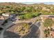 Aerial view featuring a neighborhood and a small cul-de-sac with desert landscaping at 2432 W Oberlin Way, Phoenix, AZ 85085