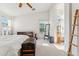 Main bedroom boasts natural light, and an en suite bathroom with a separate tub at 2432 W Oberlin Way, Phoenix, AZ 85085