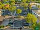 Street view of the neighborhood commercial area with palm trees, landscaping and street parking at 2432 W Oberlin Way, Phoenix, AZ 85085