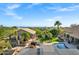 Tranquil aerial backyard view with a pool, guest house, patio and manicured landscaping at 26475 N Wrangler Rd, Scottsdale, AZ 85255