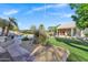 Backyard with a pool, desert landscaping, and a charming casita, creating a private oasis at 26475 N Wrangler Rd, Scottsdale, AZ 85255