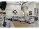 Spacious living room featuring neutral tones, couches, and vaulted ceilings at 26475 N Wrangler Rd, Scottsdale, AZ 85255