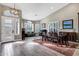 Open living space with a large dining table and ample natural light at 26475 N Wrangler Rd, Scottsdale, AZ 85255