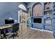 Office boasts custom built-ins and shelving, providing ample storage space at 26475 N Wrangler Rd, Scottsdale, AZ 85255