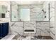 Updated bathroom showcasing a marble-tiled shower with a glass enclosure and modern fixtures at 278 S San Luis Rey Trl, Casa Grande, AZ 85194
