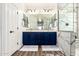 Updated bathroom featuring dual sinks, modern fixtures, and a stunning marble-tiled shower at 278 S San Luis Rey Trl, Casa Grande, AZ 85194