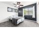 Relaxing bedroom features a neutral color scheme, plush carpet, and a modern ceiling fan at 278 S San Luis Rey Trl, Casa Grande, AZ 85194