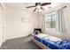 Bedroom features a neutral color scheme, plush carpet, and a modern ceiling fan at 278 S San Luis Rey Trl, Casa Grande, AZ 85194