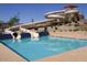 Community pool featuring a slide and clear blue water at 278 S San Luis Rey Trl, Casa Grande, AZ 85194