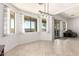 Bright dining area with large windows, offering natural light and backyard views at 278 S San Luis Rey Trl, Casa Grande, AZ 85194