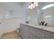Bathroom with double sinks, granite countertops and new fixtures at 29384 N Rosewood Dr, San Tan Valley, AZ 85143