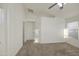 A neutral bedroom with plush carpet, ceiling fan and closet at 29384 N Rosewood Dr, San Tan Valley, AZ 85143