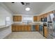 Kitchen featuring stainless steel appliances, oak cabinets, and a view of the yard at 29384 N Rosewood Dr, San Tan Valley, AZ 85143