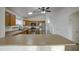 Oak kitchen with stainless steel appliances, including a refrigerator and oven at 29384 N Rosewood Dr, San Tan Valley, AZ 85143