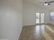 Spacious room with tile flooring and white walls, providing a neutral backdrop at 29384 N Rosewood Dr, San Tan Valley, AZ 85143