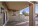 Outdoor patio area provides relaxation space with a view of the landscaped backyard at 29384 N Rosewood Dr, San Tan Valley, AZ 85143