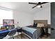 Bedroom with a ceiling fan, a window, and a desk with laptop at 2946 N 14Th St # 37, Phoenix, AZ 85014