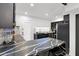Kitchen featuring striking black marble countertops, stainless steel appliances, and ample lighting at 2946 N 14Th St # 37, Phoenix, AZ 85014