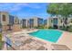 Community pool featuring lounge chairs and tables at 2946 N 14Th St # 37, Phoenix, AZ 85014