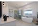 Spa bathroom with a soaking tub, glass shower, double sink vanity and mountain views at 29587 N 156Th St, Scottsdale, AZ 85262