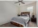 Comfortable bedroom with a queen-sized bed and bedside tables at 3026 N 305Th Dr, Buckeye, AZ 85396
