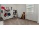 Bonus room with exercise equipment and sports-themed decorations at 3026 N 305Th Dr, Buckeye, AZ 85396