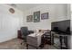 Cozy office space with desk, chair, and natural light at 3026 N 305Th Dr, Buckeye, AZ 85396
