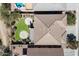 An aerial view of the roof and backyard, revealing the landscaping and the home's layout at 4416 W Magellan Dr, New River, AZ 85087