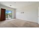 Bedroom features a sliding glass door leading to a balcony with views at 4416 W Magellan Dr, New River, AZ 85087