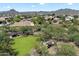 Aerial view of Anthem neighborhood featuring a park and lush landscaping, ideal for families at 4416 W Magellan Dr, New River, AZ 85087