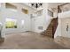 Bright and airy foyer with a staircase, large windows, and a spacious layout perfect for welcoming guests at 4416 W Magellan Dr, New River, AZ 85087