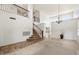 Grand foyer featuring a staircase, chandelier, and high ceilings creating an open and inviting atmosphere at 4416 W Magellan Dr, New River, AZ 85087
