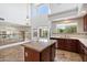 Bright kitchen featuring stainless steel appliances, granite countertops, and high ceilings at 4416 W Magellan Dr, New River, AZ 85087