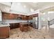 Bright kitchen featuring stainless steel appliances, granite countertops, and high ceilings at 4416 W Magellan Dr, New River, AZ 85087