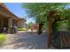 Fully landscaped backyard with a pergola and space to relax and enjoy the Arizona sunshine at 4609 W Challenger Trl, New River, AZ 85087