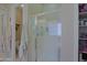 Bathroom with glass shower, toilet, and built-in shelves at 4609 W Challenger Trl, New River, AZ 85087