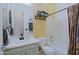 Bathroom featuring a vanity with a white countertop and muted blue cabinets, plus tub-shower combination at 4609 W Challenger Trl, New River, AZ 85087