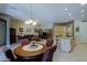 The dining room and living room combine for an open floor plan and comfortable living at 4609 W Challenger Trl, New River, AZ 85087